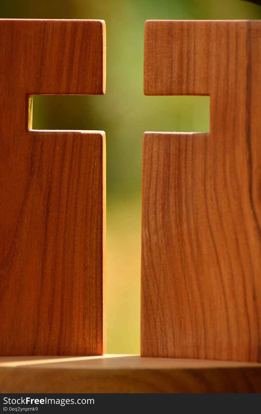 2 Brown Wooden Boards Forming Cross