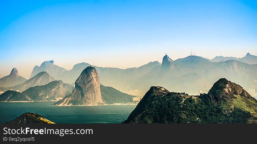 Fog Covered Mountains during Daytime