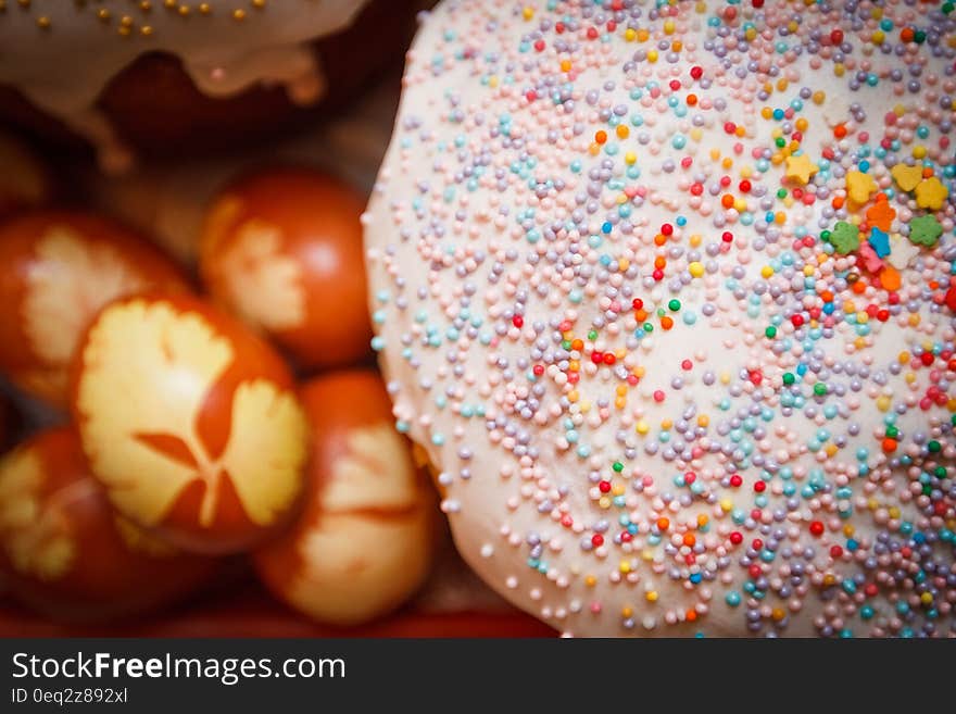 Doughnut Near Orange and White Egg