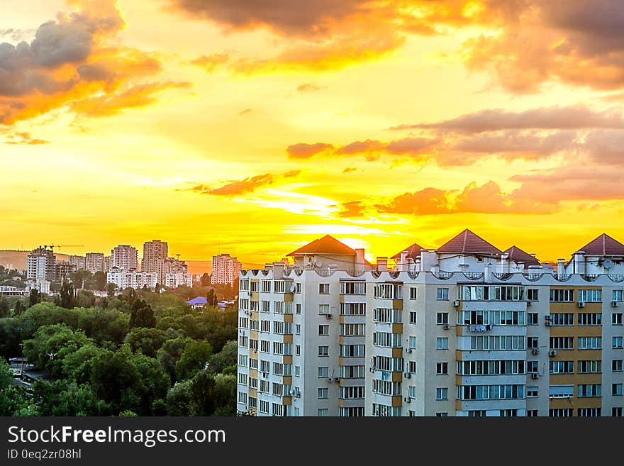 Gray White High Rise Building during Sun Set