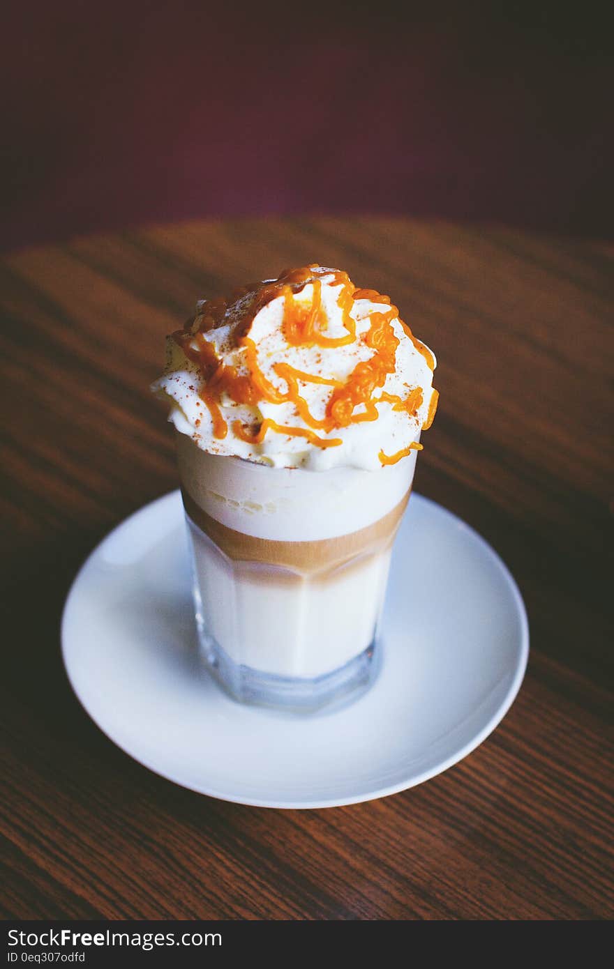 White and Brown Caramel Frappe on Clear Drinking Glass