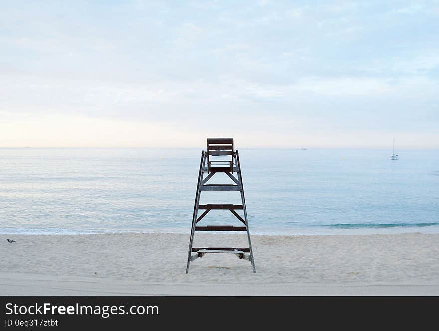 Grey Metal Step Ladder Near Beach during Daytime