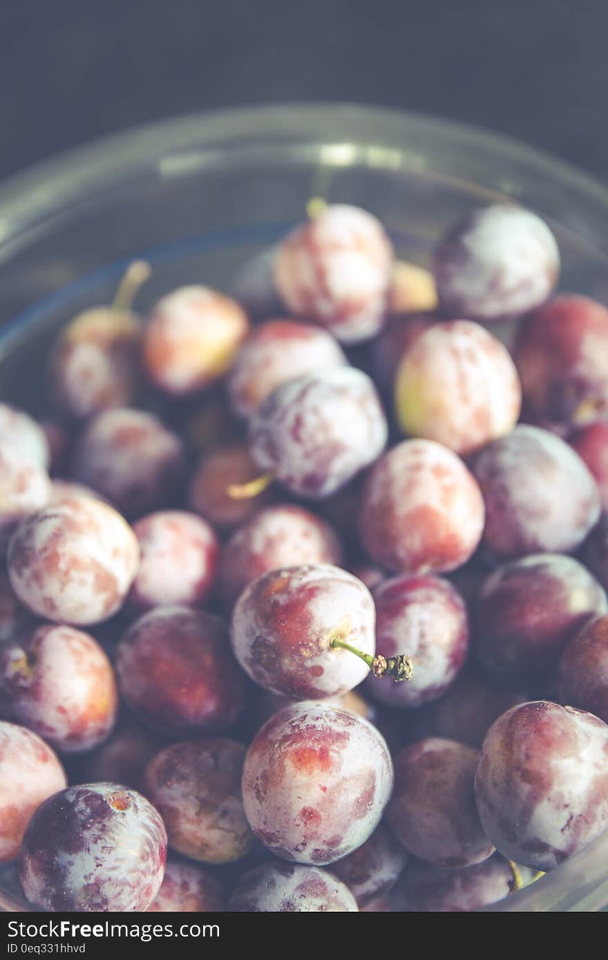 Grapes on Clear Glass Container