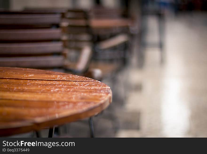 Rain drops on restaurant table on outdoor terrace. Rain drops on restaurant table on outdoor terrace