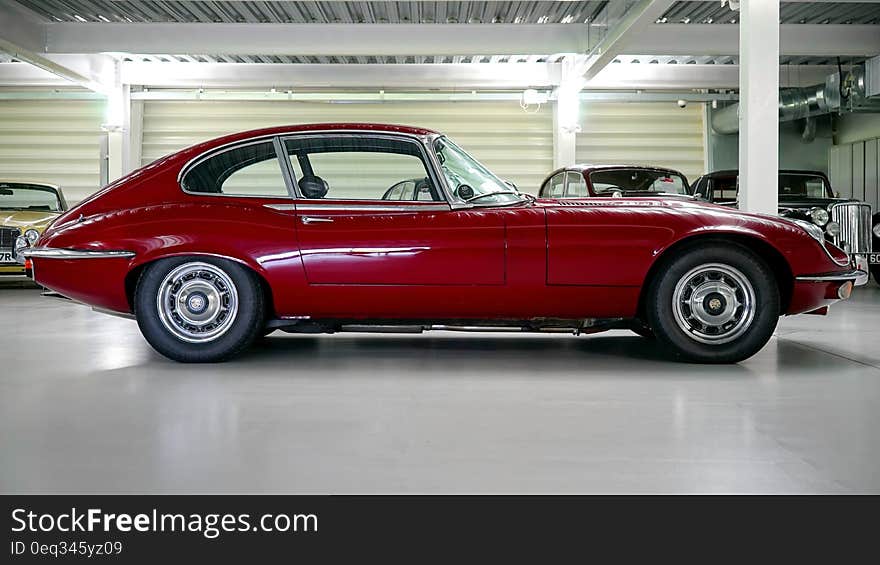 Black Red Classic Car in a Garage