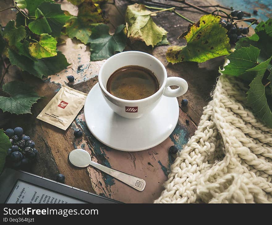 White Ceramic Tea Cup With Coffee Inside