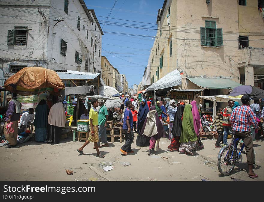 General street scene in Hamar Weyne market in the Somali capital Mogadishu, 05 August, 2013. 06 August marks 2 years since the Al Qaeda-affiliated extremist group Al Shabaab withdrew from Mogadishu following sustained operations by forces of the Somali National Army &#x28;SNA&#x29; backed by troops of the African Union Mission in Somalia &#x28;AMISOM&#x29; to retake the city. Since the group&#x27;s departure the country&#x27;s captial has re-established itself and a sense of normality has returned. Buildings and infrastructure devastated and destroyed by two decades of conflict have been repaired; thousands of Diaspora Somalis have returned home to invest and help rebuild their nation; foreign embassies and diplomatic missions have reopened and for the first time in many years, Somalia has an internationally recognised government.. AU-UN IST PHOTO / STUART PRICE. General street scene in Hamar Weyne market in the Somali capital Mogadishu, 05 August, 2013. 06 August marks 2 years since the Al Qaeda-affiliated extremist group Al Shabaab withdrew from Mogadishu following sustained operations by forces of the Somali National Army &#x28;SNA&#x29; backed by troops of the African Union Mission in Somalia &#x28;AMISOM&#x29; to retake the city. Since the group&#x27;s departure the country&#x27;s captial has re-established itself and a sense of normality has returned. Buildings and infrastructure devastated and destroyed by two decades of conflict have been repaired; thousands of Diaspora Somalis have returned home to invest and help rebuild their nation; foreign embassies and diplomatic missions have reopened and for the first time in many years, Somalia has an internationally recognised government.. AU-UN IST PHOTO / STUART PRICE.