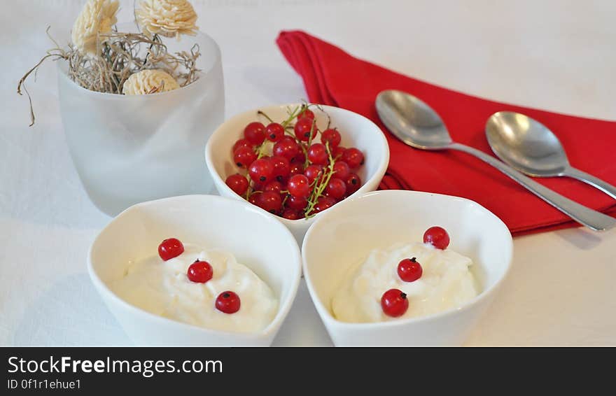 Stainless Steel Spoon on Red Table Napkin