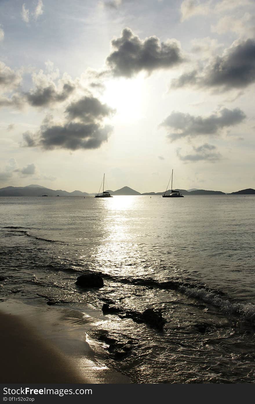 Enjoying the beauty and warmth of Saloman Bay on a partly cloudy July evening. Enjoying the beauty and warmth of Saloman Bay on a partly cloudy July evening