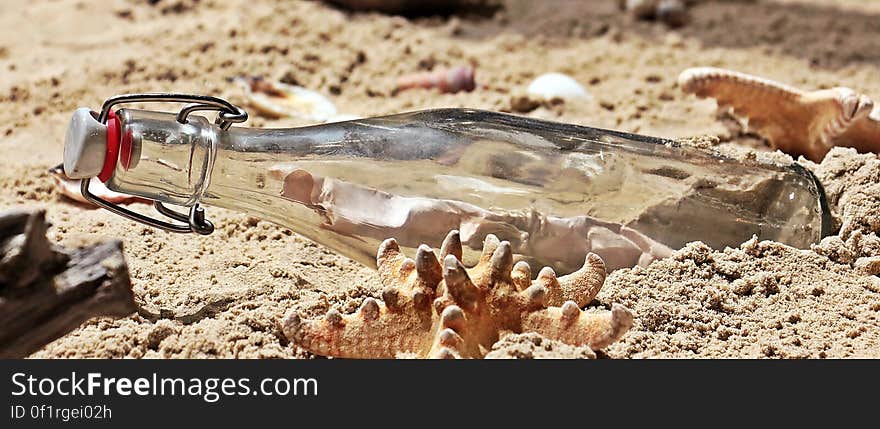 Message in a Bottle on Sand