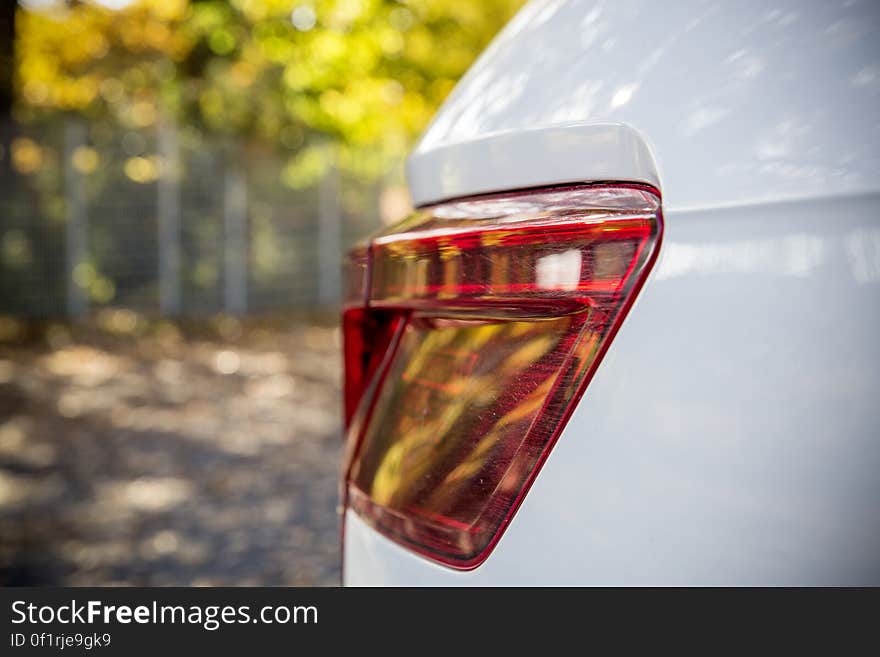 A close up of a brake light on a fender.