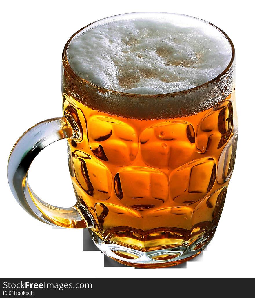 A glass beer stein filled with lager beer. A glass beer stein filled with lager beer.