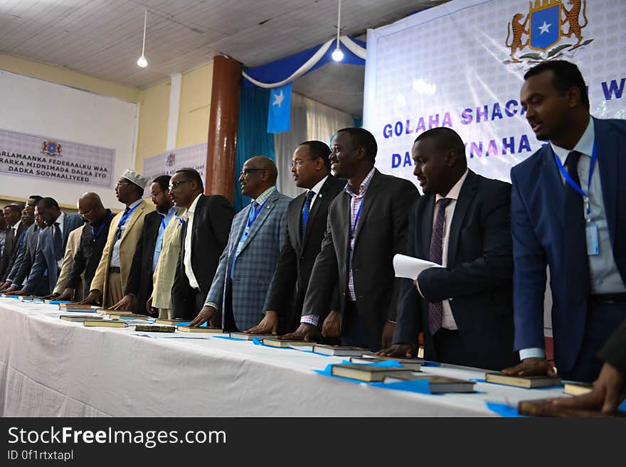 New parliamentarians are sworn in during an inauguration ceremony for members of Somalia&#x27;s Upper House and the House of the People in Mogadishu on December 27, 2016. AMISOM Photo / Ilyas Ahmed. New parliamentarians are sworn in during an inauguration ceremony for members of Somalia&#x27;s Upper House and the House of the People in Mogadishu on December 27, 2016. AMISOM Photo / Ilyas Ahmed