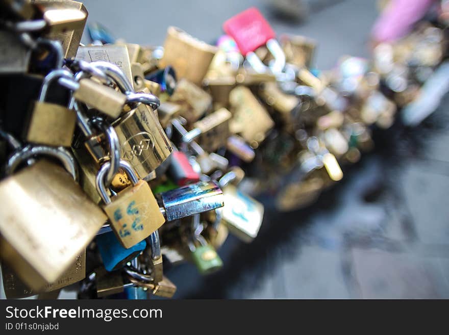 A close up of a bunch of love padlocks.