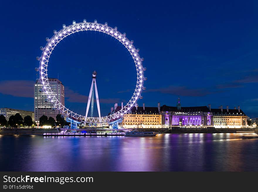 The London Eye ferris wheel at night.