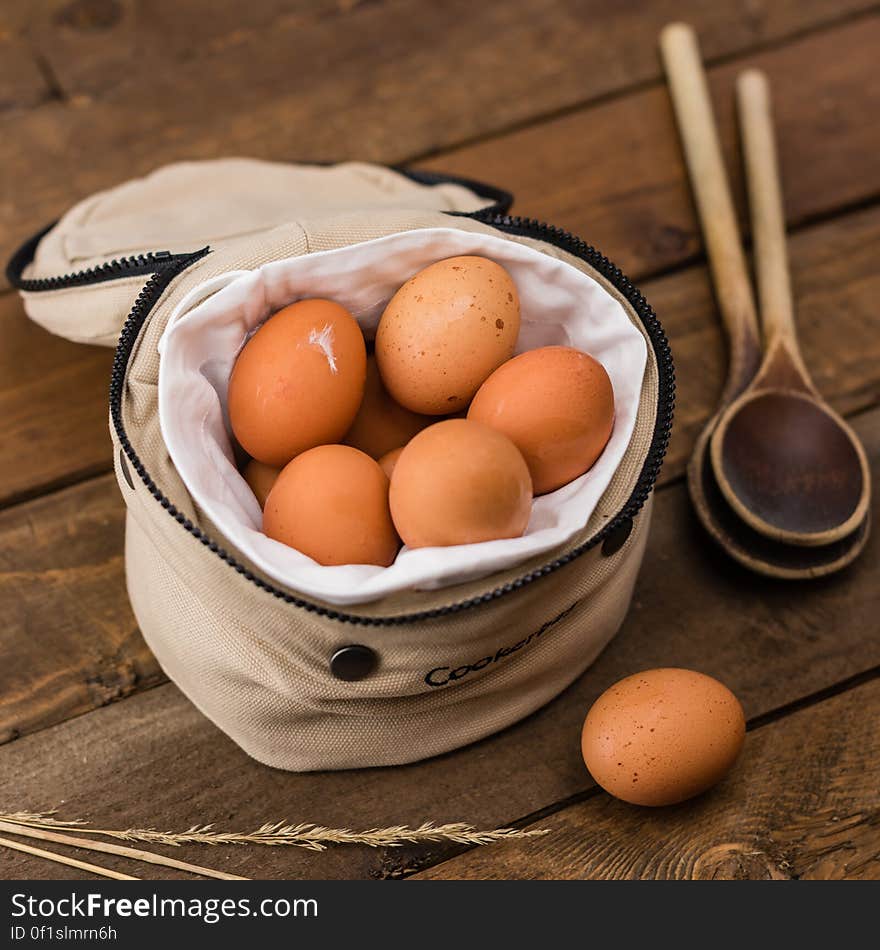 Beige Egg Inside a White Bag