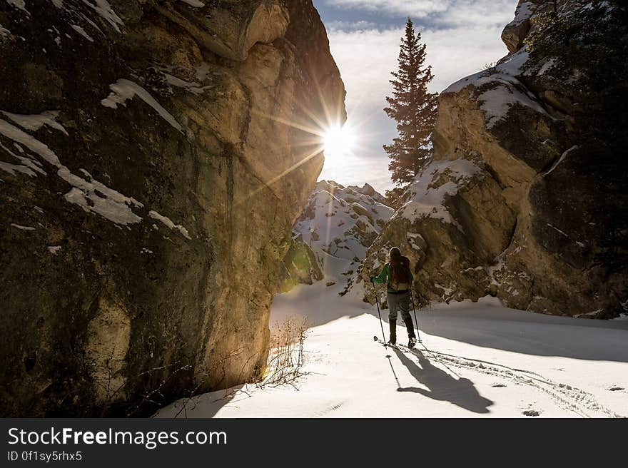 Man Hiking in Snowy Mountain