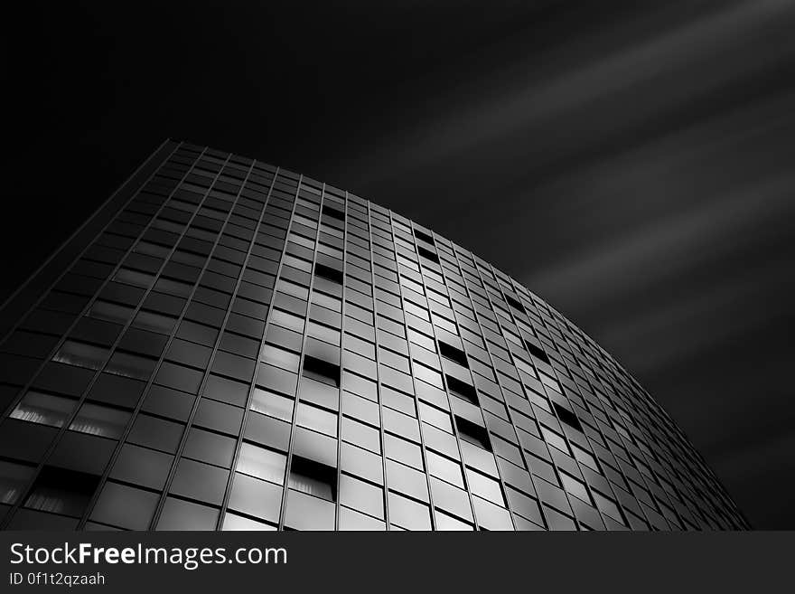 The facade of a modern building in black and white.