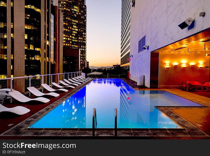 An inner city hotel with a pool and lounge. An inner city hotel with a pool and lounge.