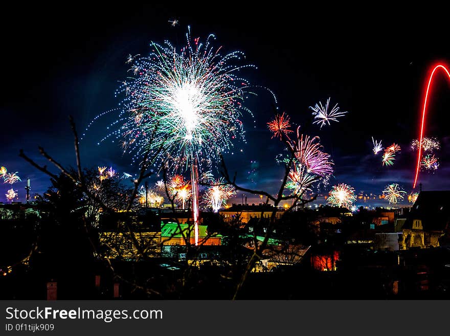 A fireworks display in the night. A fireworks display in the night.