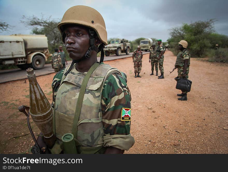 Burundian troops serving with the African Union Mission in Somalia &#x28;AMISOM&#x29; form a secure perimeter along a road near the village of Modmoday approx. 40km east of the central Somali town of Baidoa. The Burundians, together with forces of the Somali National Army &#x28;SNA&#x29; have been mounting &#x27;snap&#x27; foot patrols in villages and areas to the east of Baidoa where Al Qaeda-affiliated extremist group Al Shabaab mount attacks against local herdsmen, villages and travelers along the busy Baidoa-Mogadishu road. The AMISOM troops also use the patrols as an opportunity to provide occasional free medical treatment and fresh, potable drinking water for residents in the area. AU/UN IST PHOTO / ABDI DAKAN. Burundian troops serving with the African Union Mission in Somalia &#x28;AMISOM&#x29; form a secure perimeter along a road near the village of Modmoday approx. 40km east of the central Somali town of Baidoa. The Burundians, together with forces of the Somali National Army &#x28;SNA&#x29; have been mounting &#x27;snap&#x27; foot patrols in villages and areas to the east of Baidoa where Al Qaeda-affiliated extremist group Al Shabaab mount attacks against local herdsmen, villages and travelers along the busy Baidoa-Mogadishu road. The AMISOM troops also use the patrols as an opportunity to provide occasional free medical treatment and fresh, potable drinking water for residents in the area. AU/UN IST PHOTO / ABDI DAKAN.