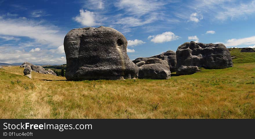 Located near Duntroon, between Oamaru and Omarama in Otago, the Elephant Rocks are fairly straightforward to find: from near Duntroon, take Livingston-Duntroon Road and follow the signposts until you get to the Elephant Rocks.The Elephant Rocks are massive limestone formations sitting in a sea of grass on private farmland. The rocks were once sand at the bottom of the sea that accumulated 25 million years ago. These sediments were buried and the pressure turned the sand into rock, or limestone. When the whole area of limestone lifted and surfaced, the forces of the wind and water did their part in shaping the limestone.The rocks come in all shapes and sizes, and are popular with climbers, especially for doing some serious bouldering. The area may also give some people a certain sensation of déjà vu; especially those that are fans of “The Chronicles of Narnia” movie: the Elephant Rocks served as a location for Aslan’s camp. Located near Duntroon, between Oamaru and Omarama in Otago, the Elephant Rocks are fairly straightforward to find: from near Duntroon, take Livingston-Duntroon Road and follow the signposts until you get to the Elephant Rocks.The Elephant Rocks are massive limestone formations sitting in a sea of grass on private farmland. The rocks were once sand at the bottom of the sea that accumulated 25 million years ago. These sediments were buried and the pressure turned the sand into rock, or limestone. When the whole area of limestone lifted and surfaced, the forces of the wind and water did their part in shaping the limestone.The rocks come in all shapes and sizes, and are popular with climbers, especially for doing some serious bouldering. The area may also give some people a certain sensation of déjà vu; especially those that are fans of “The Chronicles of Narnia” movie: the Elephant Rocks served as a location for Aslan’s camp.