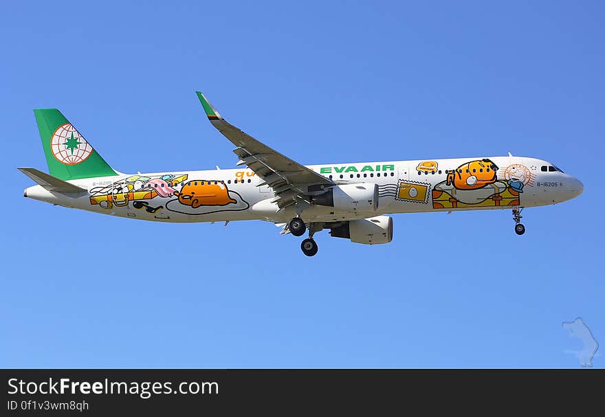 Eva Air airplane illustrated with cartoon characters in flight against blue skies.