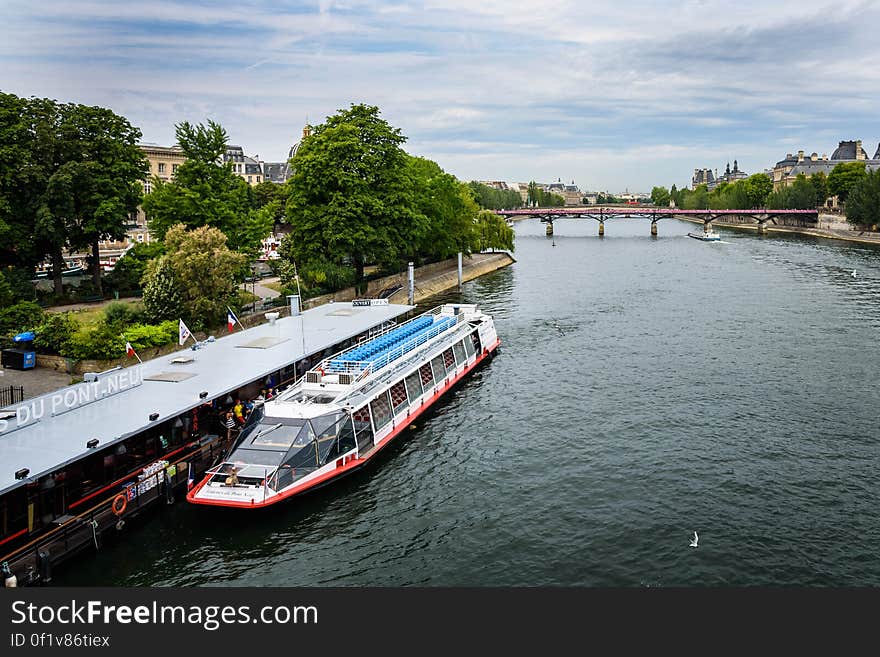 These tour boats cruise the Seine, giving visitors a view of attractions along the river. These tour boats cruise the Seine, giving visitors a view of attractions along the river.