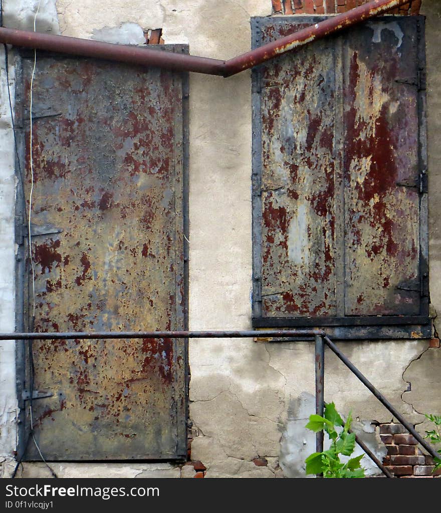 distressed wall with rusty panels