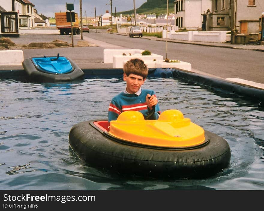 A small boating pond outside an amusement arcade sometime in the early 1980s. I was annoyed about something that day and I steered the boat into the centre of the pool and wouldn&#x27;t budge!. A small boating pond outside an amusement arcade sometime in the early 1980s. I was annoyed about something that day and I steered the boat into the centre of the pool and wouldn&#x27;t budge!