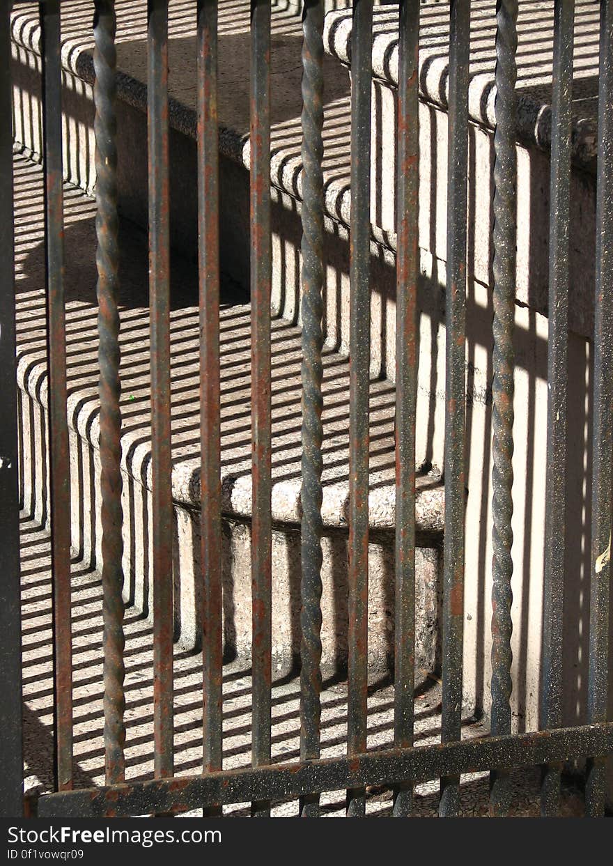 staircase-and-railing shadow composition