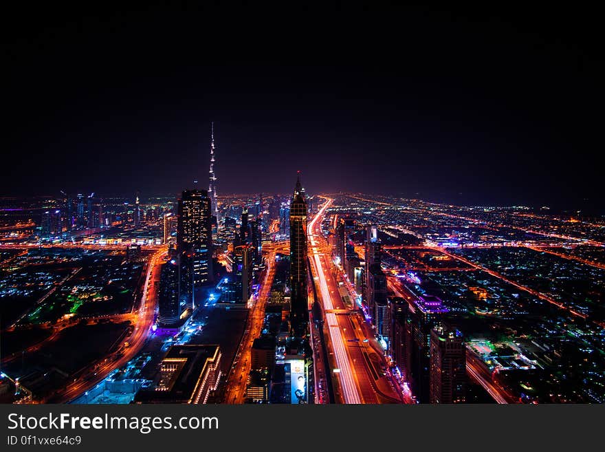 High Rise Buildings during Night Time Photo