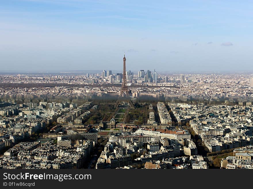 A panoramic view of Paris with the Eiffel Tower in the middle. A panoramic view of Paris with the Eiffel Tower in the middle.