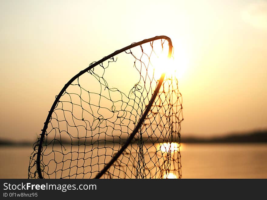 Silhouette of a net during sunset. Silhouette of a net during sunset.