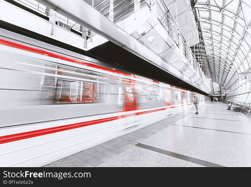 Blurred Motion of Illuminated Railroad Station in City