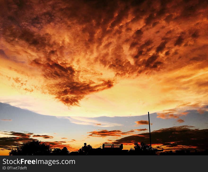 A sunset sky with bright colorful clouds. A sunset sky with bright colorful clouds.