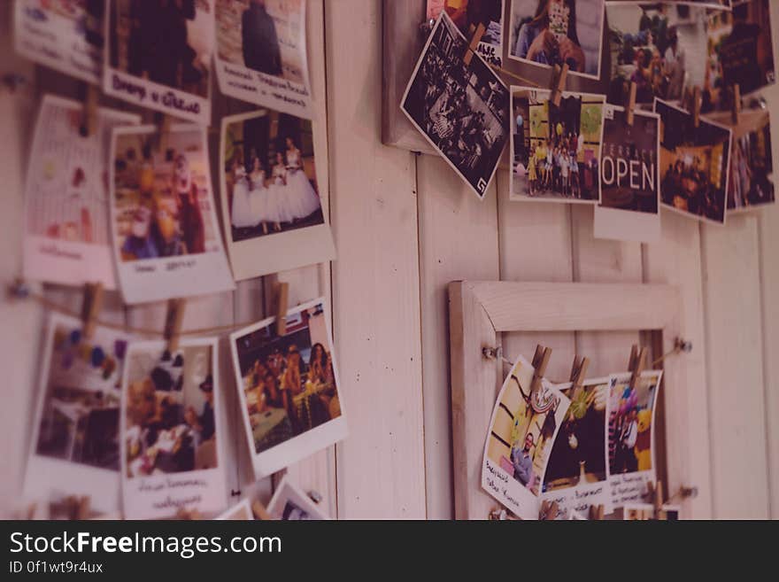 Instant photos hanging on a wall. Instant photos hanging on a wall.