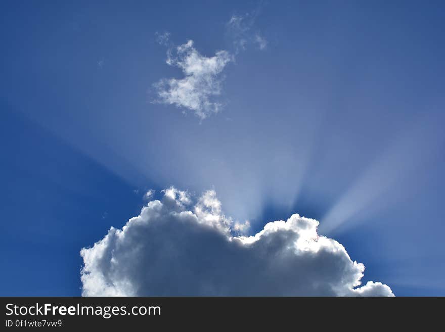 White Cloudy Sky With Sunrays