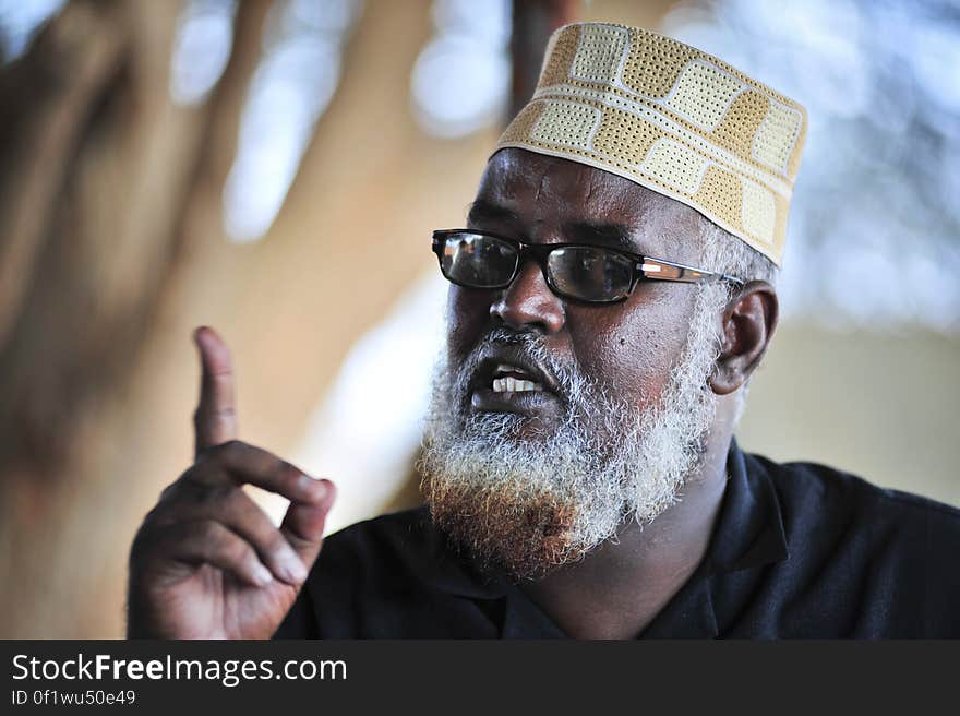 Sheikh Madobe speaks to journalists at Kismayo International Airport on November 30. The Sheikh answered questions regarding the recent liberation of Kismayo from al-Shabab and the future of the region. AU-UN IST PHOTO / TOBIN JONES. Sheikh Madobe speaks to journalists at Kismayo International Airport on November 30. The Sheikh answered questions regarding the recent liberation of Kismayo from al-Shabab and the future of the region. AU-UN IST PHOTO / TOBIN JONES.