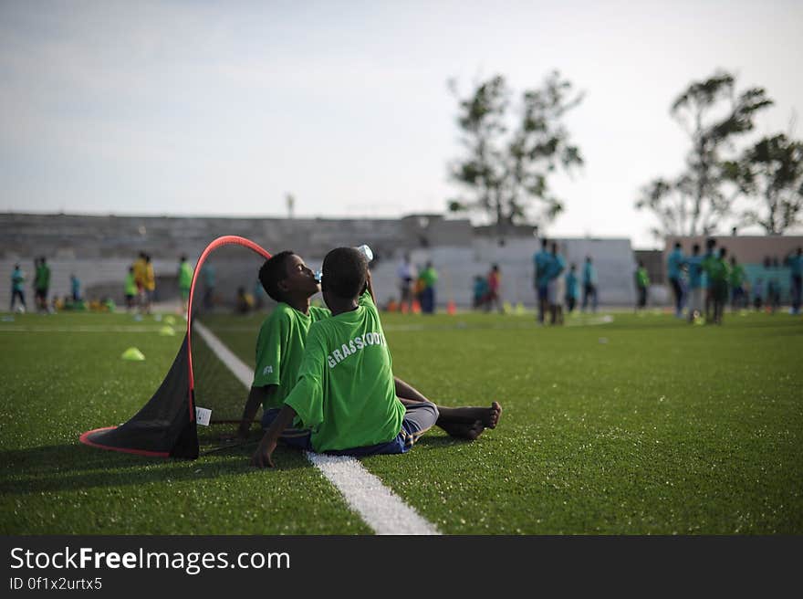 Two children take a break during practice at the FIFA Football Festival in Mogadishu, Somalia, on August 19. FIFA, having had no presence in Somalia for the last 26 years, today held its first training session in Mogadishu since the country fell into civil war. Illegal under al Shabab, football has made a huge comeback in Somalia, with Mogadishu&#x27;s streets literally filling up with children each afternoon as they come out to play the game. AU UN IST PHOTO / TOBIN JONES. Two children take a break during practice at the FIFA Football Festival in Mogadishu, Somalia, on August 19. FIFA, having had no presence in Somalia for the last 26 years, today held its first training session in Mogadishu since the country fell into civil war. Illegal under al Shabab, football has made a huge comeback in Somalia, with Mogadishu&#x27;s streets literally filling up with children each afternoon as they come out to play the game. AU UN IST PHOTO / TOBIN JONES.