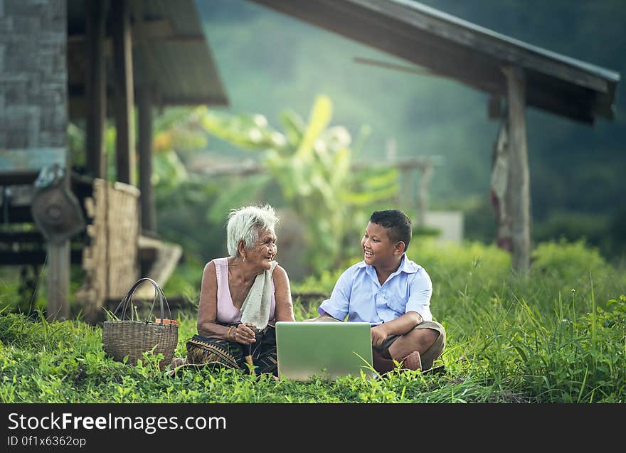 Rear View of Woman Using Mobile Phone in Farm