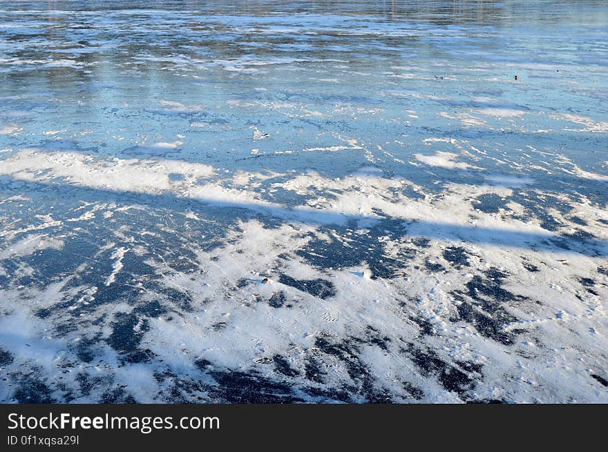 Foam in ocean waves on beach on sunny day. Foam in ocean waves on beach on sunny day.