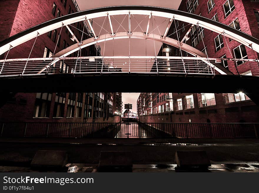 A small foot bridge over a channel in the city. A small foot bridge over a channel in the city.