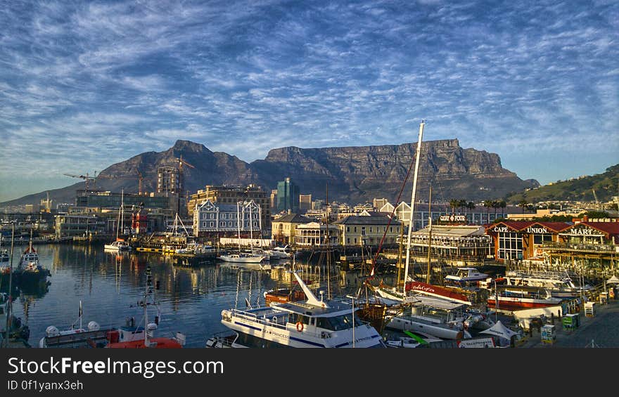 A view across the harbor of Cape Town and the Table Mountain in South Africa. A view across the harbor of Cape Town and the Table Mountain in South Africa.