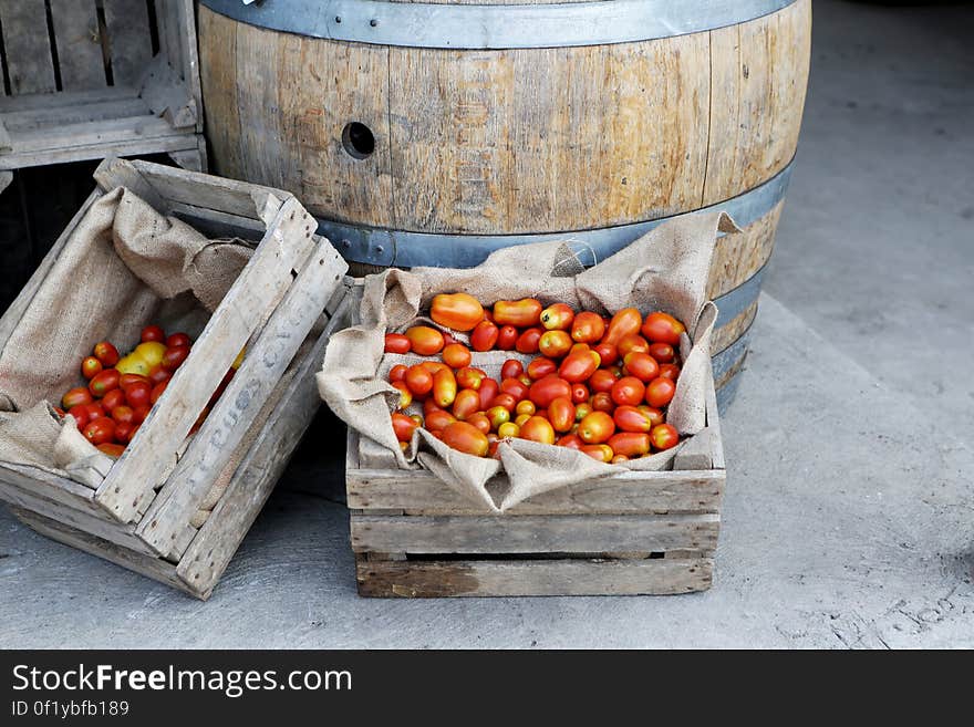 Orange Tomato on Brown Wooden Crate