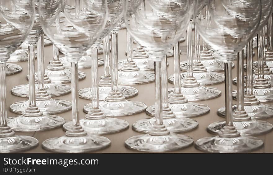 A lot of stemmed wine glasses. A lot of stemmed wine glasses.