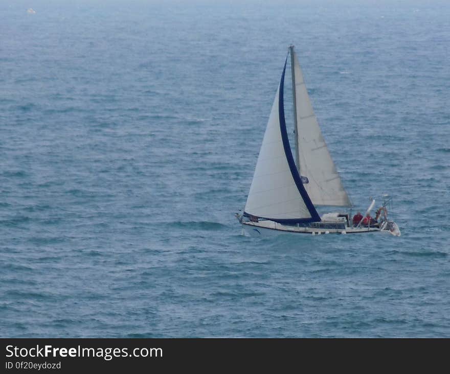 A sailboat on the seas. A sailboat on the seas.