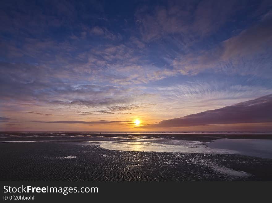 Here is an hdr photograph of a sunset taken from beach in Cleveleys, Lancashire, England, UK. Here is an hdr photograph of a sunset taken from beach in Cleveleys, Lancashire, England, UK.