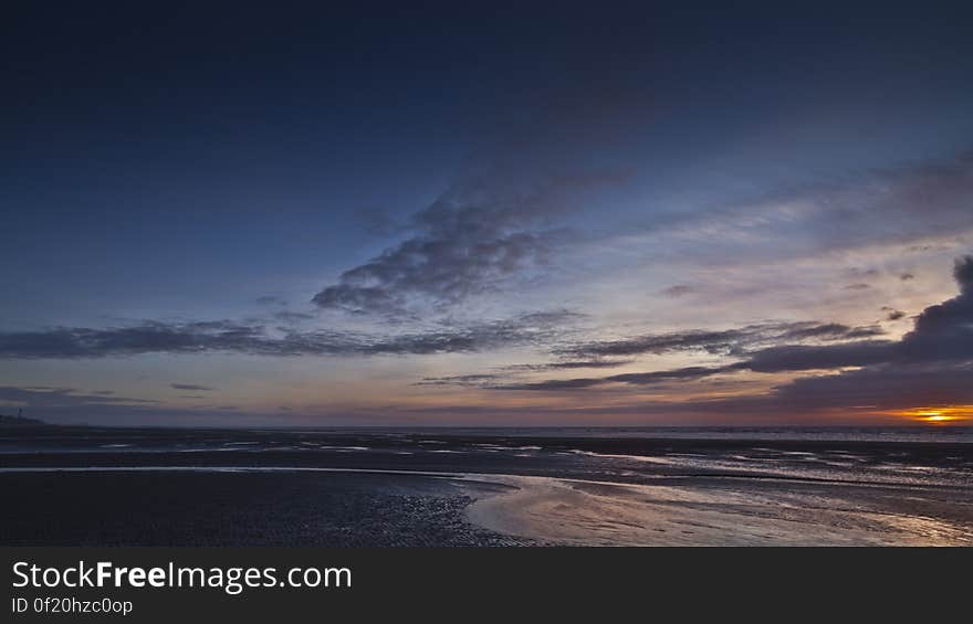 Here is an hdr photograph of a sunset at the beach in Cleveleys looking south towards Blackpool. Located in Cleveleys, Lancashire, England, UK.