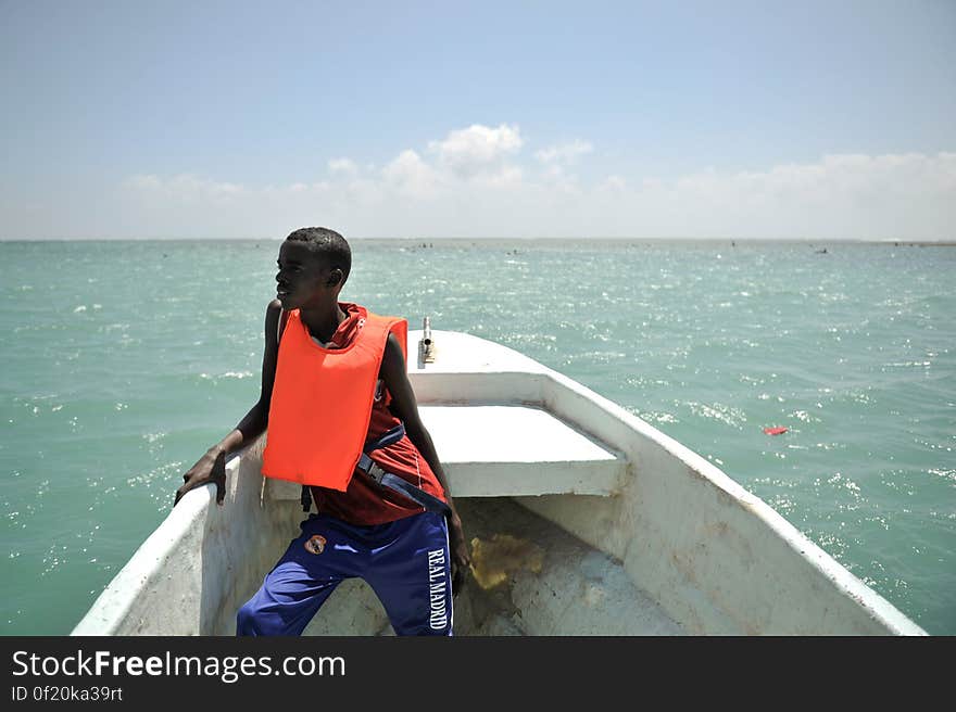 A young lifeguard keeps an eye out for swimmers in distress while patrolling off of Lido beach in Mogadishu, Somalia, on January 31. The Mogadishu lifeguards, consisting entirely of a volunteer force of fisherman, began patrolling Lido beach in September 2013 after a spate of drownings. Mogadishu&#x27;s beaches have become a popular destination for the city&#x27;s residents since al Shabab withdrew the majority of its militants from the city in 2011. AU UN IST PHOTO / Tobin Jones. A young lifeguard keeps an eye out for swimmers in distress while patrolling off of Lido beach in Mogadishu, Somalia, on January 31. The Mogadishu lifeguards, consisting entirely of a volunteer force of fisherman, began patrolling Lido beach in September 2013 after a spate of drownings. Mogadishu&#x27;s beaches have become a popular destination for the city&#x27;s residents since al Shabab withdrew the majority of its militants from the city in 2011. AU UN IST PHOTO / Tobin Jones